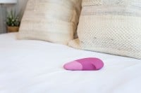 Přikládací vibrátor Womanizer Vibe Dusky Pink