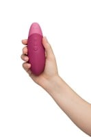 Přikládací vibrátor Womanizer Vibe Dusky Pink