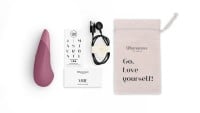 Přikládací vibrátor Womanizer Vibe Dusky Pink